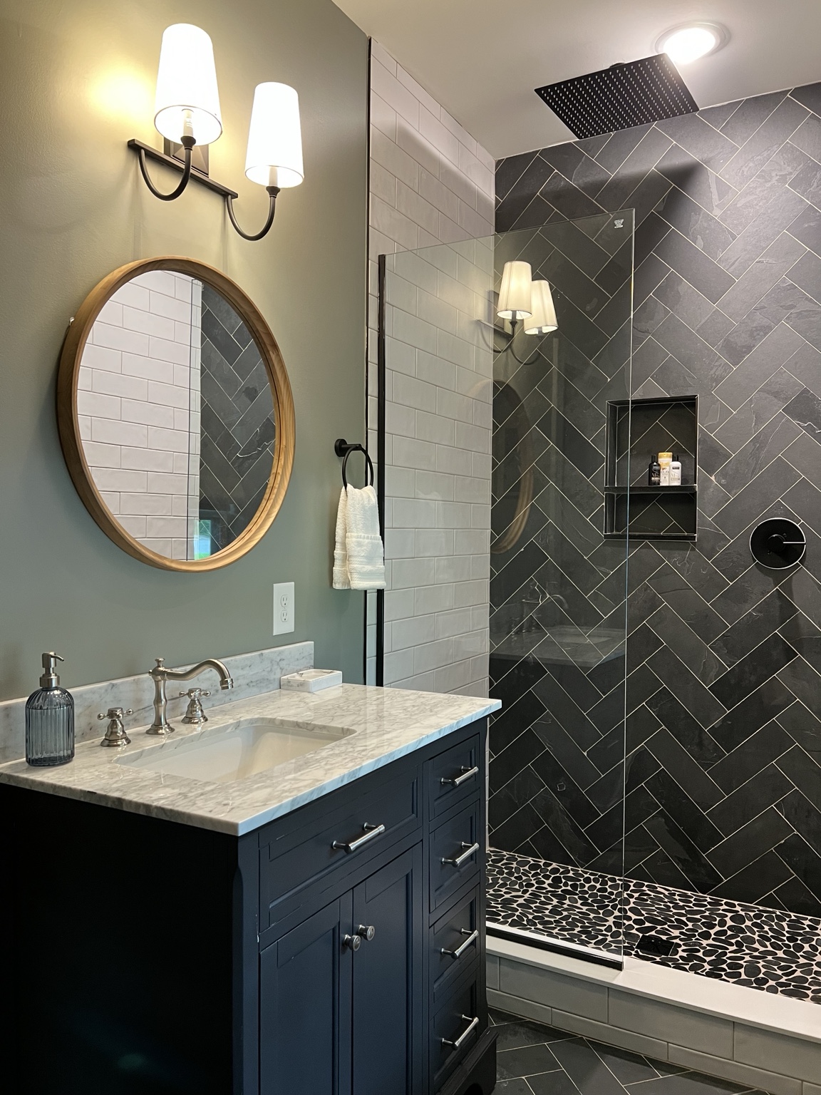 Custom herringbone tile bathroom shower