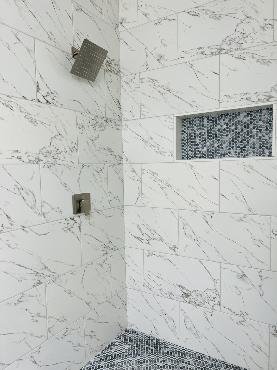 Marble-look shower tile